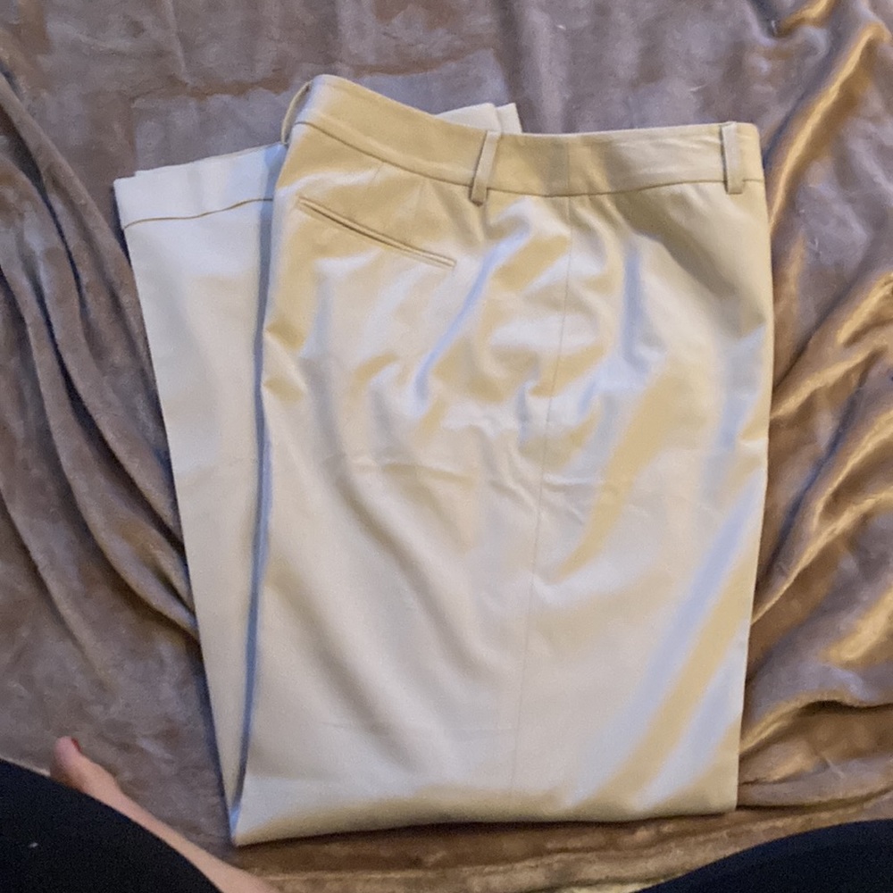 Cream wide leg fully lined cuffed pants.